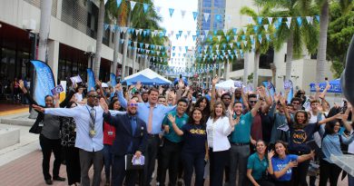 Faculty, staff and students posing for a picture.