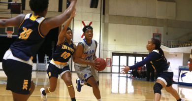 Daliyah Brown trying to make a basket.