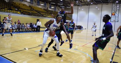MDC men's basketball team on the court.