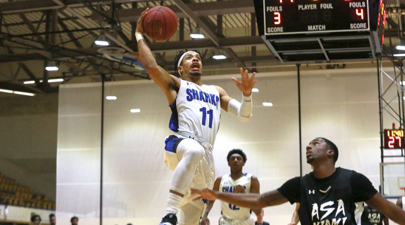 Montese Blake about to make a basket.