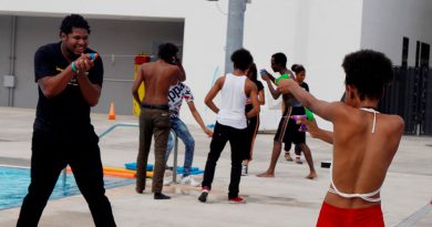 Students having a water gun fight.