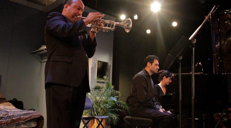 Faculty performing on stage.