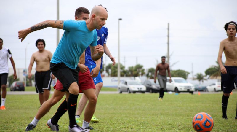 Amnel Molina about to kick the ball. Soccer club